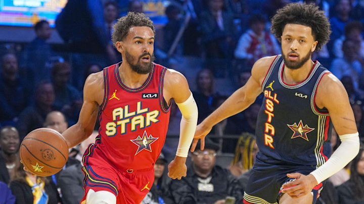 February 16, 2025; San Francisco, CA, USA; Chuck’s Global Stars guard Trae Young (11, left) of the Atlanta Hawks controls the ball against Kenny’s Young Stars guard Cade Cunningham (2, right) of the Detroit Pistons during the 2025 NBA All Star Game at Chase Center. Mandatory Credit: Kyle Terada-Imagn Images