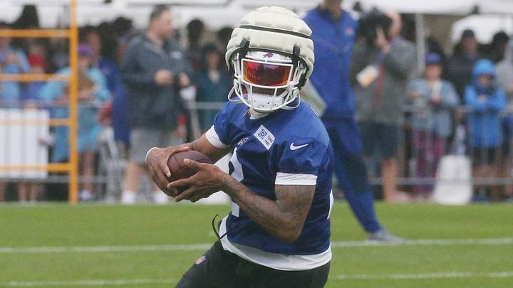 Bills wide receiver DJ Moore heads up field after a catch across the middle during the opening day of Buffalo Bills training camp at St. John Fisher University Wednesday, July 29, 2026 in Pittsford. Bills wide receiver DJ Moore heads up field after a catch across the middle during the opening day of Buffalo Bills training camp at St. John Fisher University Wednesday, July 29, 2026 in Pittsford.