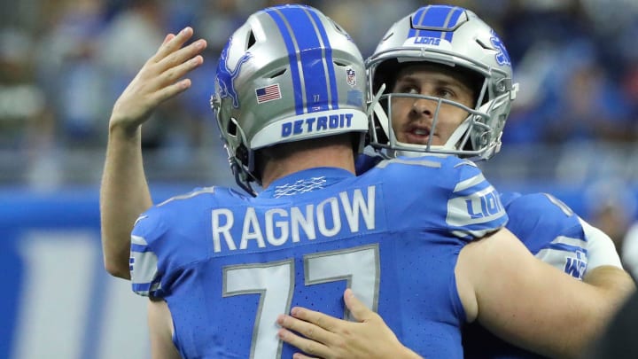 Detroit Lions quarterback Jared Goff (16) and center Frank Ragnow (77) warm up before action against the Atlanta Falcons Sunday, Sept. 24 2023. Detroit Lions quarterback Jared Goff (16) and center Frank Ragnow (77) warm up before action against the Atlanta Falcons Sunday, Sept. 24 2023.