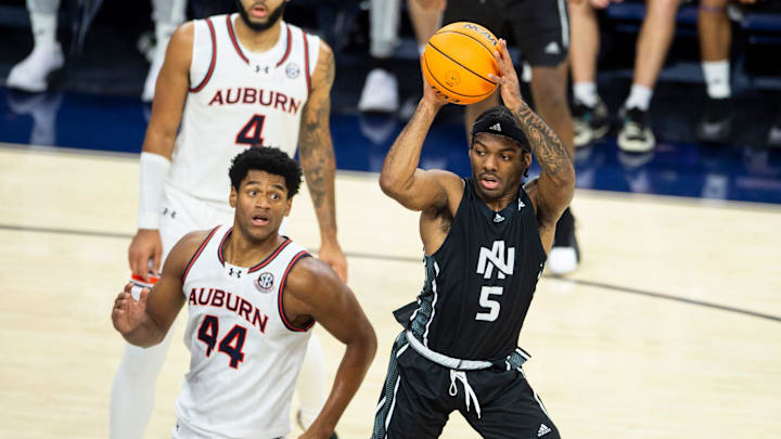North Alabama Lions guard Jacari Lane (5) passes out as Auburn Tigers take on North Alabama Lions at Neville Arena in Auburn, Ala., on Monday, Nov. 18, 2024. Auburn Tigers defeated North Alabama Lions 102-69.