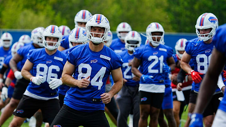 Bills Zach Davidson, center, and teammates go through stretches during a voluntary workout at their practice facility in Orchard Park on May 27, 2025. Bills Zach Davidson, center, and teammates go through stretches during a voluntary workout at their practice facility in Orchard Park on May 27, 2025.