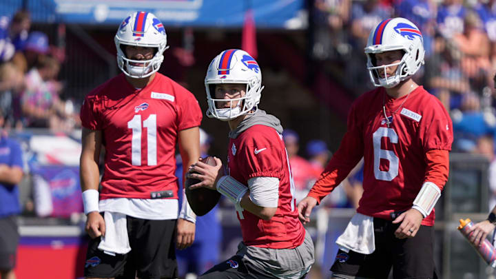Buffalo Bills quarterback Mike White gets ready to throw to a receiver with fellow back ups quarterback Mitchell Trubisky and quarterback Shane Buechele waiting their turn to rotate through during the Buffalo Bills training camp at St. John Fisher University in Pittsford on July 23, 2025.