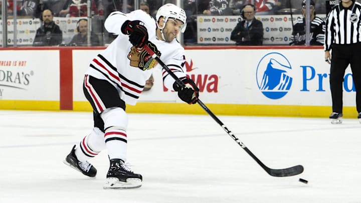 Dec 14, 2024; Newark, New Jersey, USA; Chicago Blackhawks left wing Taylor Hall (71) shoots the puck against the New Jersey Devils during the first period at Prudential Center. Mandatory Credit: John Jones-Imagn Images