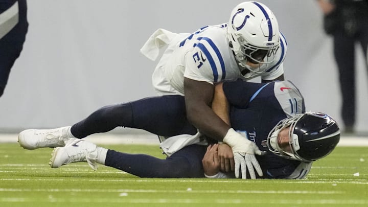 Dec 22, 2024; Indianapolis, Indiana, USA; Indianapolis Colts defensive end Kwity Paye (51) sacks Tennessee Titans quarterback Mason Rudolph (11) during a game against the Tennessee Titans at Lucas Oil Stadium. Mandatory Credit: Christine Tannous/USA Today Network via Imagn Images Dec 22, 2024; Indianapolis, Indiana, USA; Indianapolis Colts defensive end Kwity Paye (51) sacks Tennessee Titans quarterback Mason Rudolph (11) during a game against the Tennessee Titans at Lucas Oil Stadium. Mandatory Credit: Christine Tannous/USA Today Network via Imagn Images