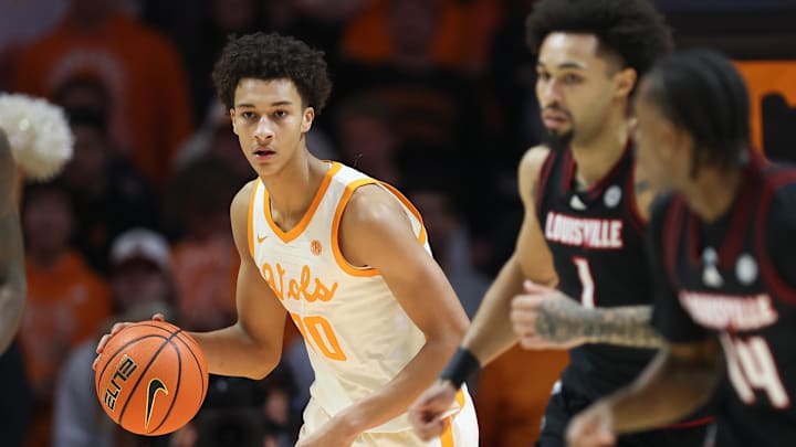 Dec 16, 2025; Knoxville, Tennessee, USA; Tennessee Volunteers forward Nate Ament (10) brings the ball up court against the Louisville Cardinals during the first half at Thompson-Boling Arena at Food City Center. Mandatory Credit: Randy Sartin-Imagn Images