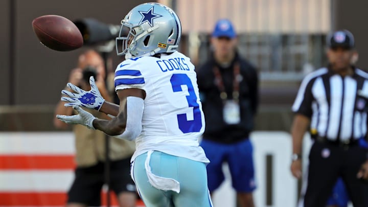 Dallas Cowboys wide receiver Brandin Cooks (3) eyes down a touchdown pass.