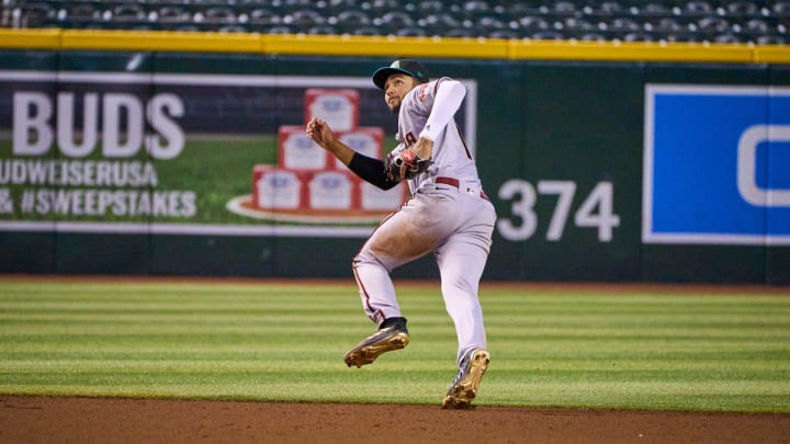 Oct 15, 2022; Phoenix, AZ, USA; Salt River Rafters infielder Jordan Lawlar (1) runs to the outfield as he chases a ball at Chase Field.

Mlb Dbacks Fall League Prospects