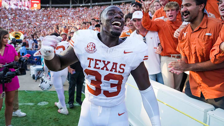 Texas Longhorns linebacker David Gbenda (33) celebrates a win over Oklahoma Sooners 34-3 in the Red River Rivalry Football Game between the University of Oklahoma Sooners and the University of Texas Longhorns at the Cotton Bowl Stadium in Dallas, TX on Saturday Oct. 12, 2024. Texas Longhorns linebacker David Gbenda (33) celebrates a win over Oklahoma Sooners 34-3 in the Red River Rivalry Football Game between the University of Oklahoma Sooners and the University of Texas Longhorns at the Cotton Bowl Stadium in Dallas, TX on Saturday Oct. 12, 2024.