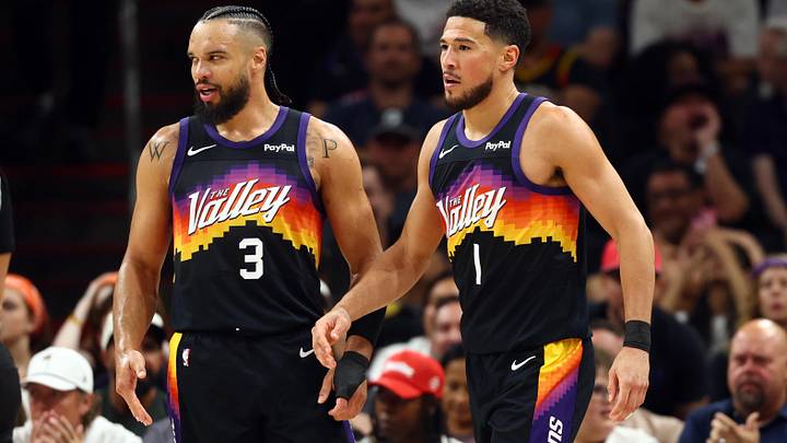Apr 7, 2026; Phoenix, Arizona, USA; Phoenix Suns forward Dillon Brooks (3) and guard Devin Booker (1) against the Houston Rockets at Mortgage Matchup Center. Mandatory Credit: Mark J. Rebilas-Imagn Images
