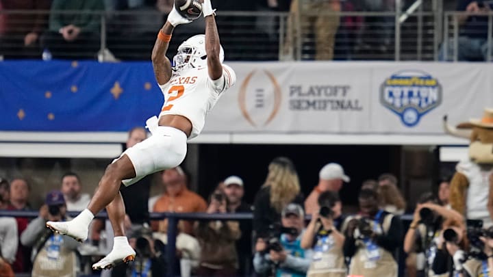 Texas Longhorns wide receiver Matthew Golden catches a pass during the second half of the Cotton Bowl Classic. Texas Longhorns wide receiver Matthew Golden catches a pass during the second half of the Cotton Bowl Classic.
