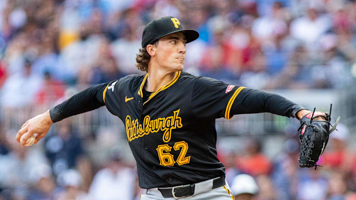 Jun 29, 2024; Cumberland, Georgia, USA; Pittsburgh Pirates pitcher Kyle Nicolas (62) pitches the ball against Atlanta Braves during the tenth inning at Truist Park. Mandatory Credit: Jordan Godfree-Imagn Images