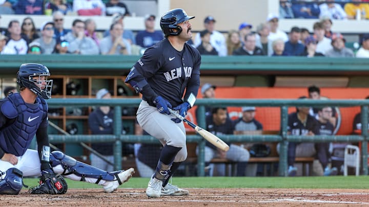 Mar 21, 2025; Lakeland, Florida, USA; New York Yankees catcher Austin Wells (28) watches a fly ball during the third inning against the Detroit Tigers at Publix Field at Joker Marchant Stadium. 