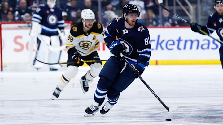 Dec 10, 2024; Winnipeg, Manitoba, CAN; Winnipeg Jets forward Kyle Connor (81) skates into the Boston Bruins zone during the second period at Canada Life Centre. Mandatory Credit: Terrence Lee-Imagn Images Dec 10, 2024; Winnipeg, Manitoba, CAN; Winnipeg Jets forward Kyle Connor (81) skates into the Boston Bruins zone during the second period at Canada Life Centre. Mandatory Credit: Terrence Lee-Imagn Images