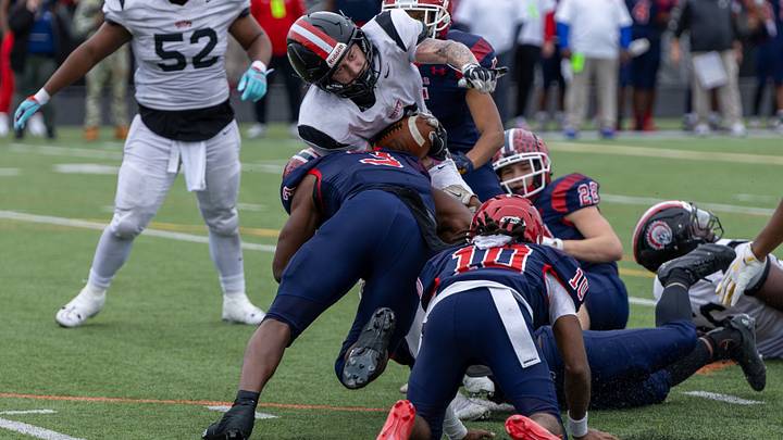Aliquippa running back JJ Work (6) fights for extra yards while being tackled by McKeesport defensive back Kemon Spell (3) in the second half of the WPIAL Class 4A championship game between Aliquippa and McKeesport Saturday, Nov. 15, 2025 at Pine-Richland Stadium in Gibsonia, Pa. Aliquippa running back JJ Work (6) fights for extra yards while being tackled by McKeesport defensive back Kemon Spell (3) in the second half of the WPIAL Class 4A championship game between Aliquippa and McKeesport Saturday, Nov. 15, 2025 at Pine-Richland Stadium in Gibsonia, Pa.