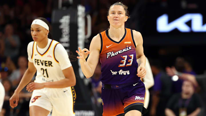 Aug 7, 2025; Phoenix, Arizona, USA; Phoenix Mercury guard Sami Whitcomb (33) celebrates a three post shot against the Indiana Fever during WNBA game at PHX Arena. Mandatory Credit: Mark J. Rebilas-Imagn Images