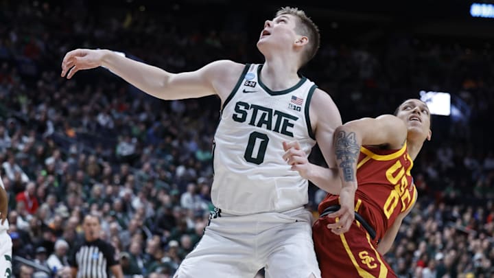 Mar 17, 2023; Columbus, OH, USA; Michigan State Spartans forward Jaxon Kohler (0) battles USC