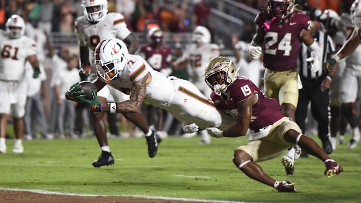 Miami wide receiver CJ Daniels scores a touchdown against Florida State defensive back Jerry Wilson.