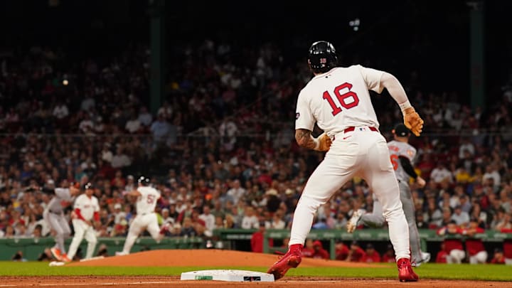 Sep 11, 2024; Boston, Massachusetts, USA; Boston Red Sox center fielder Jarren Duran (16) scores on a on a throwing error to first base against the Baltimore Orioles in the third inning at Fenway Park. Mandatory Credit: David Butler II-Imagn Images
