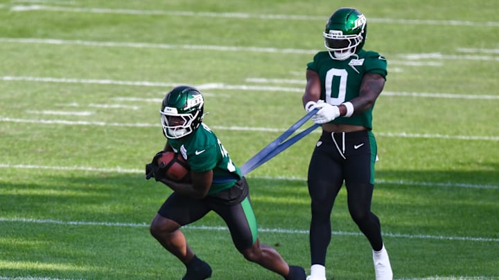 Jul 24, 2025; Florham Park, NY, USA; New York Jets running back Zach Evans (38) and running back Braelon Allen (0) participate in a drill during training camp at Atlantic Health Jets Training Center. Mandatory Credit: John Jones-Imagn Images