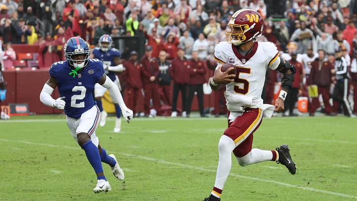 Oct 11, 2026; Landover, Maryland, USA; Washington Commanders quarterback Jayden Daniels (5) runs the ball during the third quarter against the New York Giants at Northwest Stadium. Mandatory Credit: Geoff Burke-Imagn Images Oct 11, 2026; Landover, Maryland, USA; Washington Commanders quarterback Jayden Daniels (5) runs the ball during the third quarter against the New York Giants at Northwest Stadium. Mandatory Credit: Geoff Burke-Imagn Images