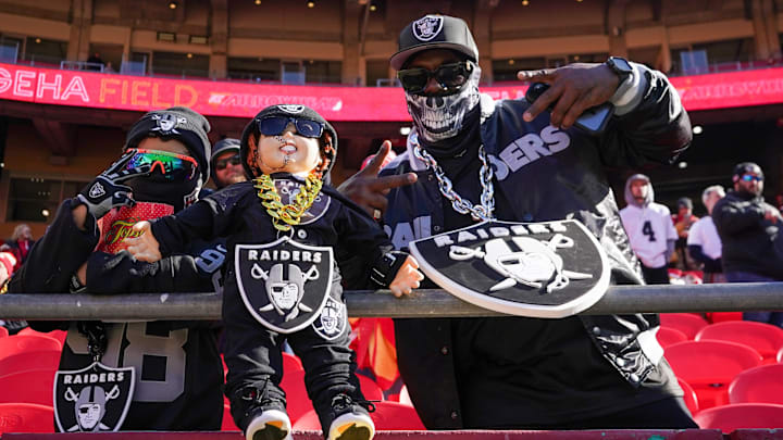 Nov 29, 2024; Kansas City, Missouri, USA; Las Vegas Raiders fans show support against the Kansas City Chiefs prior to a game at GEHA Field at Arrowhead Stadium. Mandatory Credit: Denny Medley-Imagn Images