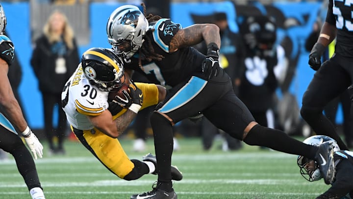 Dec 18, 2022; Charlotte, North Carolina, USA; Pittsburgh Steelers running back Jaylen Warren (30) is tackled by Carolina Panthers linebacker Shaq Thompson (7) Dec 18, 2022; Charlotte, North Carolina, USA; Pittsburgh Steelers running back Jaylen Warren (30) is tackled by Carolina Panthers linebacker Shaq Thompson (7)