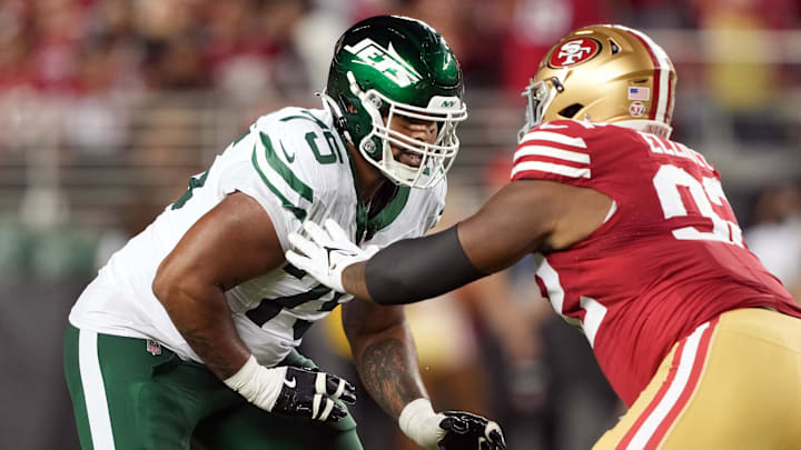 Sep 9, 2024; Santa Clara, California, USA; New York Jets guard Alijah Vera-Tucker (75) blocks against San Francisco 49ers defensive tackle Jordan Elliott (right) during the fourth quarter at Levi's Stadium. 