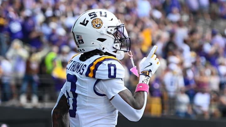 Oct 18, 2025; Nashville, Tennessee, USA;  Louisiana State Tigers wide receiver Zavion Thomas (0) celebrates with his teammates after scoring a touchdown against the Vanderbilt Commodores during the second half at FirstBank Stadium. Mandatory Credit: Steve Roberts-Imagn Images