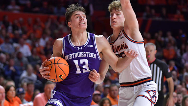 Northwestern Wildcats guard Brooks Barnhizer (13) drives the ball 