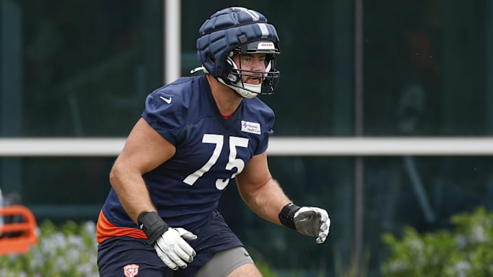 Jun 3, 2025; Lake Forest, IL, USA; Chicago Bears offensive tackle Ozzy Trapilo (75) warms up during minicamp at Halas Hall. Mandatory Credit: Kamil Krzaczynski-Imagn Images