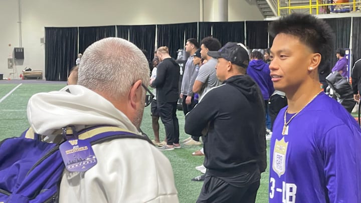 Kamren Fabiculanan shows off his new haircut, no long locks flowing out the back of his helmet.