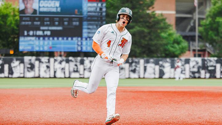 Miami Hurricanes Shortstop Jake Ogden (4) after hitting a homerun.