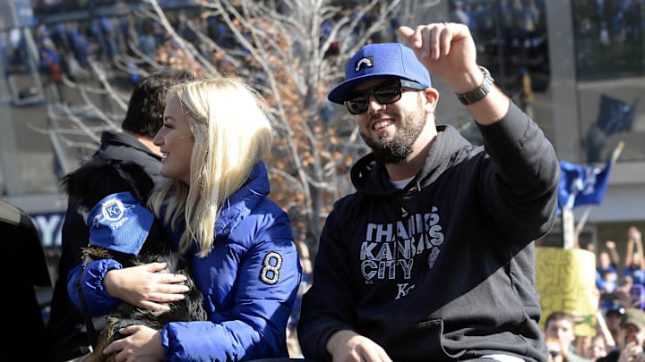 Nov 3, 2015; Kansas City, MO, USA; Kansas City Royals third baseman Mike Moustakas (8) waves to the crowd at the World Series parade. Mandatory Credit: John Rieger-Imagn Images Nov 3, 2015; Kansas City, MO, USA; Kansas City Royals third baseman Mike Moustakas (8) waves to the crowd at the World Series parade. Mandatory Credit: John Rieger-Imagn Images
