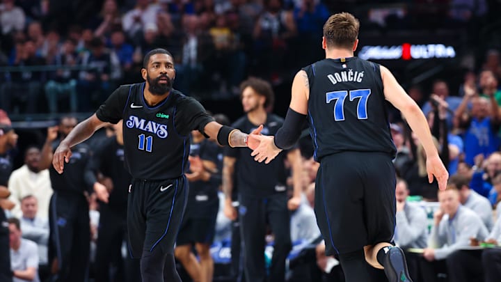 Mar 21, 2024; Dallas, Texas, USA;  Dallas Mavericks guard Kyrie Irving (11) celebrates with Dallas