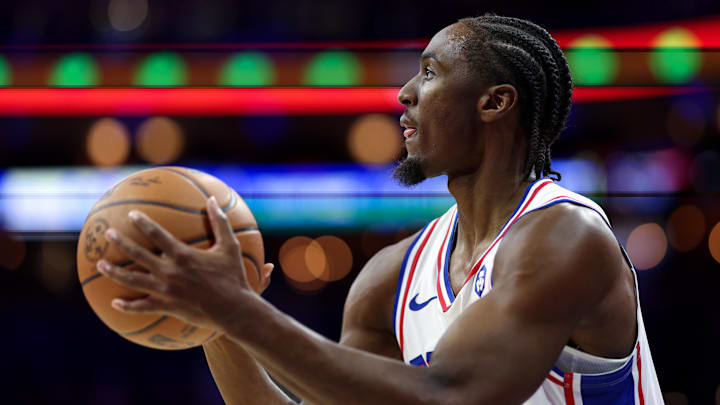 Oct 10, 2025; Philadelphia, Pennsylvania, USA; Philadelphia 76ers guard Tyrese Maxey (0) lines up a shot against the Orlando Magic during the first quarter at Xfinity Mobile Arena. Mandatory Credit: Bill Streicher-Imagn Images