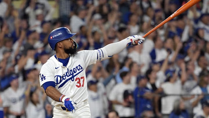 Oct 11, 2024; Los Angeles, California, USA; Los Angeles Dodgers outfielder Teoscar Hernandez (37) hits a solo home run in the seventh inning against the San Diego Padres during game five of the NLDS for the 2024 MLB Playoffs at Dodger Stadium Oct 11, 2024; Los Angeles, California, USA; Los Angeles Dodgers outfielder Teoscar Hernandez (37) hits a solo home run in the seventh inning against the San Diego Padres during game five of the NLDS for the 2024 MLB Playoffs at Dodger Stadium