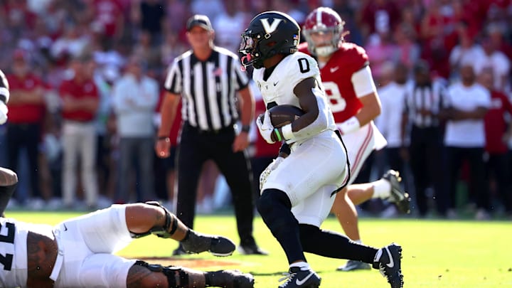 Oct 4, 2025; Tuscaloosa, Alabama, USA; Vanderbilt Commodores wide receiver Junior Sherrill (0) carries the ball during the second quarter against the Alabama Crimson Tide at Saban Field at Bryant-Denny Stadium. Mandatory Credit: David Leong-Imagn Images Oct 4, 2025; Tuscaloosa, Alabama, USA; Vanderbilt Commodores wide receiver Junior Sherrill (0) carries the ball during the second quarter against the Alabama Crimson Tide at Saban Field at Bryant-Denny Stadium. Mandatory Credit: David Leong-Imagn Images