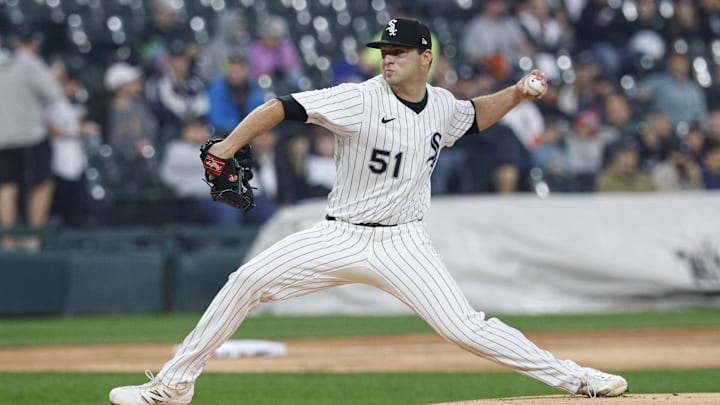 Jun 4, 2025; Chicago, Illinois, USA; Chicago White Sox starting pitcher Jared Shuster (51) delivers a pitch against the Detroit Tigers during the first inning at Rate Field. Mandatory Credit: Kamil Krzaczynski-Imagn Images