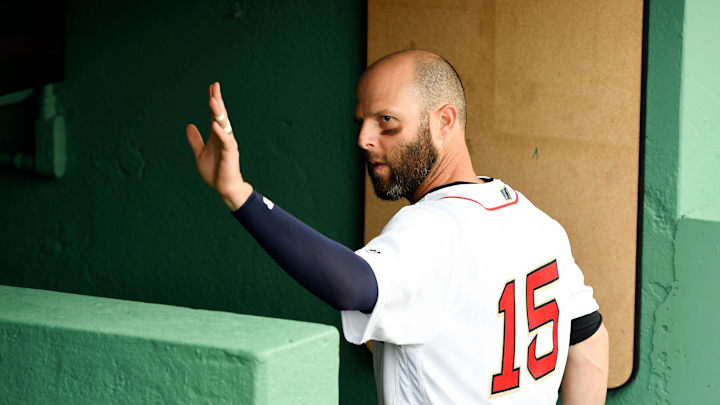 Apr 9, 2019; Boston, MA, USA; Boston Red Sox second baseman Dustin Pedroia waves to fans after batting practice before a game against the Toronto Blue Jays at Fenway Park. Mandatory Credit: Brian Fluharty-Imagn Images