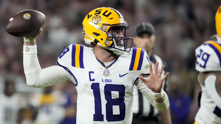 Nov 8, 2025; Tuscaloosa, Alabama, USA;  LSU quarterback Garrett Nussmeier (18) throws a pass during the second half of the game with Alabama at Saban Field at Bryant-Denny Stadium. Alabama defeated LSU 20-9. Mandatory Credit: Gary Cosby Jr.-Imagn Images