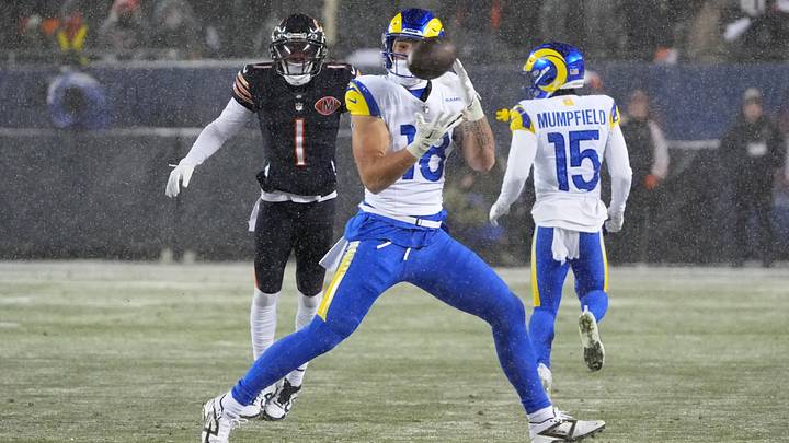 Los Angeles Rams tight end Terrance Ferguson (18) catches a pass thrown by quarterback Matthew Stafford (not pictured) against Chicago Bears cornerback Jaylon Johnson (1) during the second quarter of an NFC Divisional Round game at Soldier Field. Los Angeles Rams tight end Terrance Ferguson (18) catches a pass thrown by quarterback Matthew Stafford (not pictured) against Chicago Bears cornerback Jaylon Johnson (1) during the second quarter of an NFC Divisional Round game at Soldier Field.