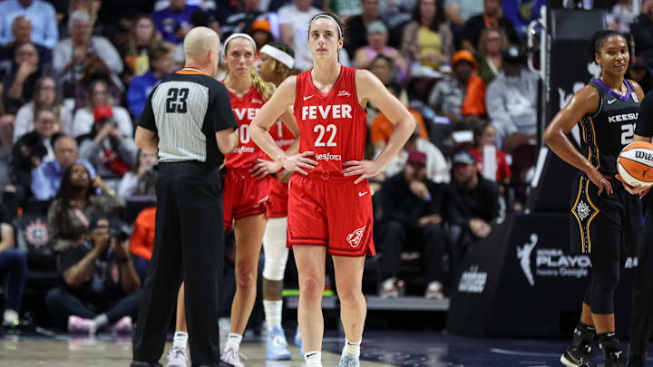 Sep 25, 2024; Uncasville, Connecticut, USA; Indiana Fever guard Caitlin Clark (22) reacts during the first half against the Connecticut Sun during game two of the first round of the 2024 WNBA Playoffs at Mohegan Sun Arena. Mandatory Credit: Paul Rutherford-Imagn Images