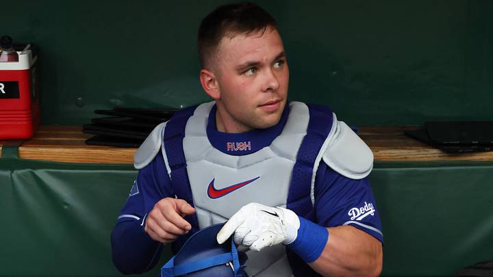 Jun 11, 2026; Pittsburgh, Pennsylvania, USA;  Los Angeles Dodgers catcher Dalton Rushing (68) prepares in the dugout before the game against the Pittsburgh Pirates at PNC Park. Mandatory Credit: Charles LeClaire-Imagn Images