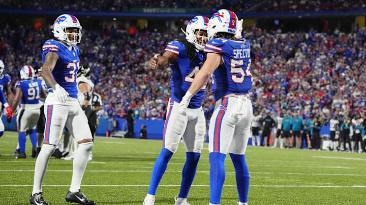 Sep 23, 2024; Orchard Park, New York, USA; Buffalo Bills linebacker Dorian Williams (42) congratulates linebacker Baylon Spector (54) for breaking up a pass against the Jacksonville Jaguars during the second half at Highmark Stadium. Sep 23, 2024; Orchard Park, New York, USA; Buffalo Bills linebacker Dorian Williams (42) congratulates linebacker Baylon Spector (54) for breaking up a pass against the Jacksonville Jaguars during the second half at Highmark Stadium.