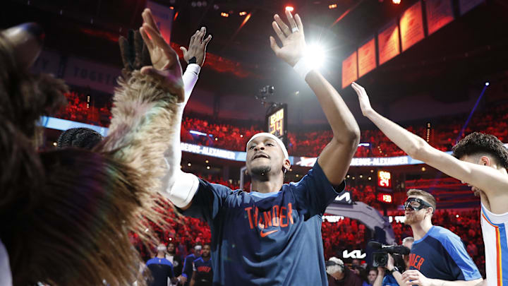 Mar 27, 2025; Oklahoma City, Oklahoma, USA; Oklahoma City Thunder guard Shai Gilgeous-Alexander (2) high fives his team during introductions before the start of a game against the Memphis Grizzlies at Paycom Center. Mandatory Credit: Alonzo Adams-Imagn Images
