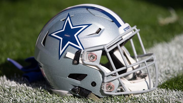 Oct 16, 2016; Green Bay, WI, USA;  A Dallas Cowboys helmet sits on the field prior to the game against the Green Bay Packers at Lambeau Field.  Dallas won 30-16.  Mandatory Credit: Jeff Hanisch-Imagn Images