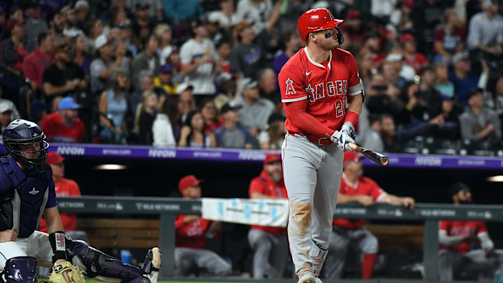Sep 20, 2025; Denver, Colorado, USA; Los Angeles Angels designated hitter Mike Trout (27) watches after hitting his 400th career home run during the eighth inning against the Colorado Rockies at Coors Field. Mandatory Credit: Christopher Hanewinckel-Imagn Images