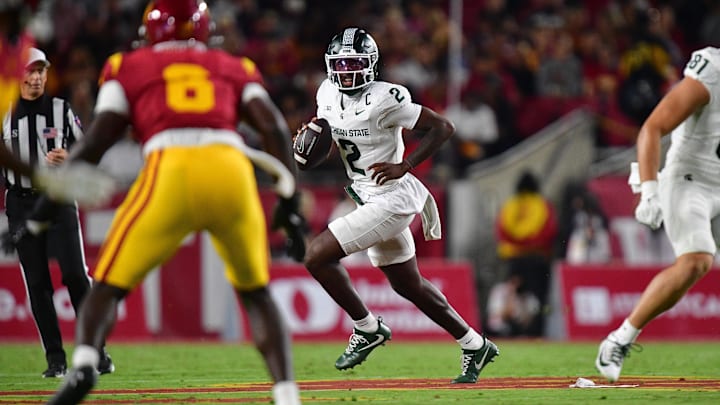 Sep 20, 2025; Los Angeles, California, USA; Michigan State Spartans quarterback Aidan Chiles (2) moves out to pass against the Southern California Trojans during the first half at the Los Angeles Memorial Coliseum. Mandatory Credit: Gary A. Vasquez-Imagn Images
