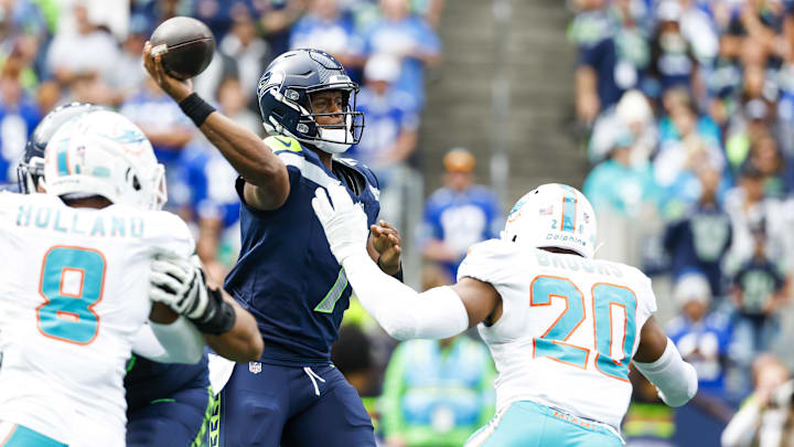Seattle Seahawks quarterback Geno Smith (7) passes against the Miami Dolphins during the second quarter at Lumen Field. 