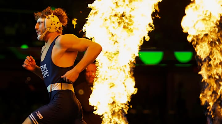 Penn State Nittany Lions Mitchell Mesenbrink enters during introductions before his match against Iowa Hawkeyes Mikey Caliendo during the NCAA Wrestling Championships at Rocket Arena.